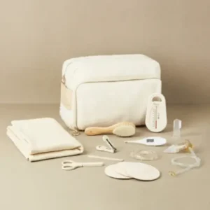 eceser de cuidados para bebé edición limitada Babymoov x Babyatoutprix en tejido rizado blanco con accesorios de higiene premium